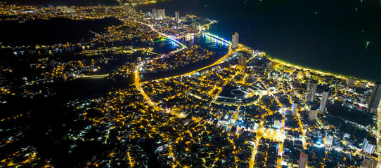 Aerial view of Nha Trang city at night. This is a famous city for cultural tourism in central Vietnam