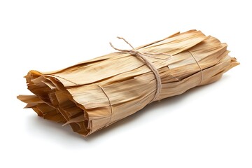 bundle of dried corn husks, neatly tied together with a thin string