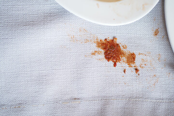 Stain on a tablecloth from spilled food or sauce