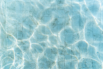 The water surface with sunlight in a swimming pool, Top view