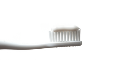 Close Up Of White Toothbrush With Toothpaste Isolated On Black Background