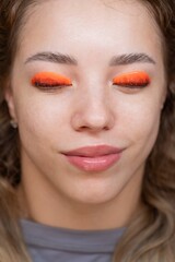 Caucasian woman undergoing eyelash lamination procedure. Top view. 