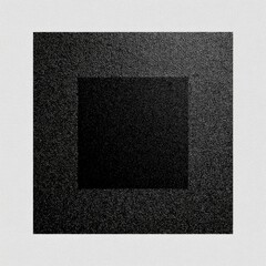 A grayscale square image featuring a slightly smaller, darker square inset, both with a textured, grainy appearance and subtle shading