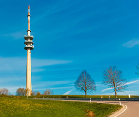Obraz premium Alpine spring view with a TV tower at the famous Hohenpeissenberg mountain, Weilheim-Schongau, Bavaria, Germany