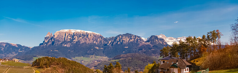 Alpine spring view with with Mount Schlern and Mount Rosengarten at the famous Ritten mountains, South Tyrol, Italy