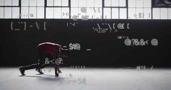 Male sprinter crouching on concrete floor with drifting code driving sprint in sports tech demo