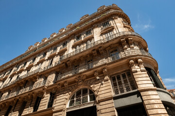 Traditional french architecture typical building view against the blue sky in Marseille France