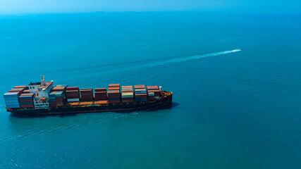 Aerial view of the freight shipping transport system cargo ship container. international...