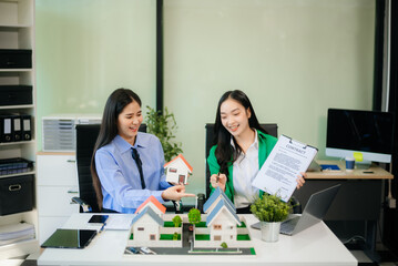 Signing a contract. Client and broker agent, lease agreement, successful deal and  Young business sitting