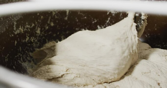 Animation of mixer stirring sourdough for bread at bakery