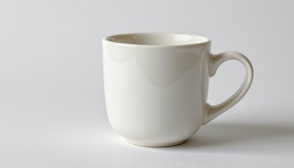 Obraz premium matte white ceramic teacup with simple handle and smooth curved surface, isolated object with no inscriptions or markings, clean, minimalistic design without any branding or text