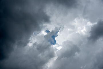 Overcast sky with dark rain cloud in rainy and windy day.