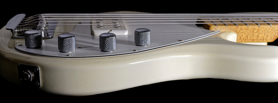 Electric Bass Guitar cream and silver side profile