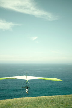 Hang glider taking off to the horizon on a beautiful day