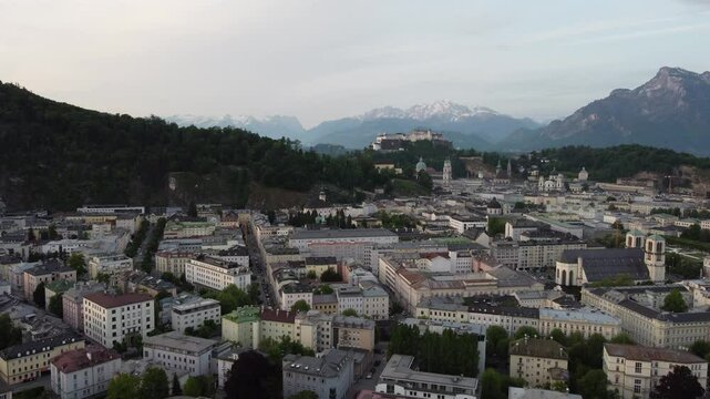 Salzburg Austria skyline of Salzburg HBF train station and town in 4k during sunset