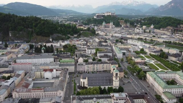 Salzburg Austria skyline of Salzburg HBF train station and town in 4k during sunset
