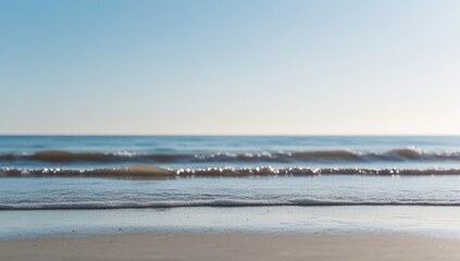 Calm Ocean Waves Gently Washing Ashore on a Bright Sunny Day providing Tranquility