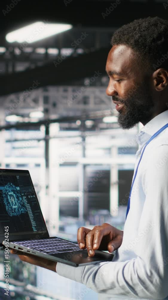 Poster vertical video programmer and colleague in data center reviewing ai llm visualizations on laptop. it