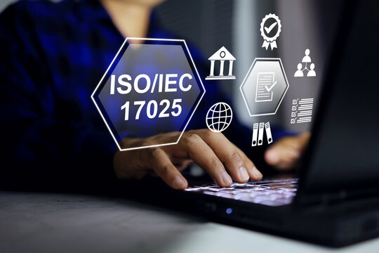 Businessman working on laptop with ISO IEC 17025 Laboratory management System for testing and calibration laboratory quality assurance certified body to approve result for industrial certificates