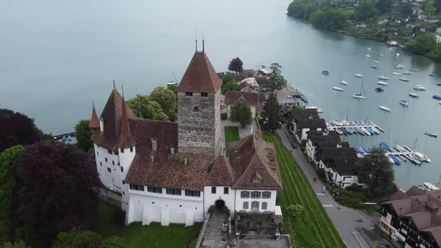 Aerial view by drone of Tunersee, Spiez city, Kanton Bern, Schweiz- famous town of Tunersee, Spiez , Kanton Bern, Schweiz.