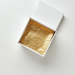 A white box with a gold foil interior, suggesting luxury or gift packaging. on white background