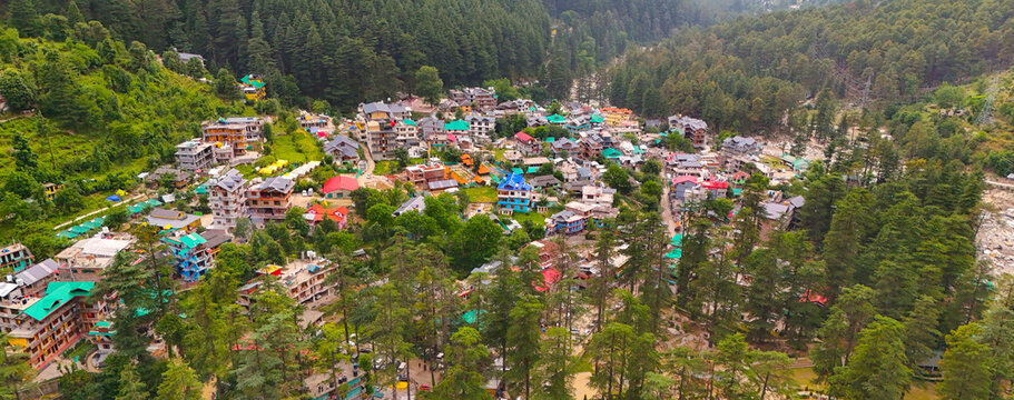 drone view of vibrant houses in kasol village