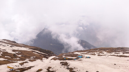 Nagaru campsite on misty Sar Pass trek