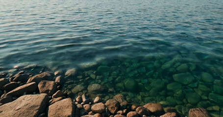 A lake made of time, with water made of seconds and a beach made of memories.