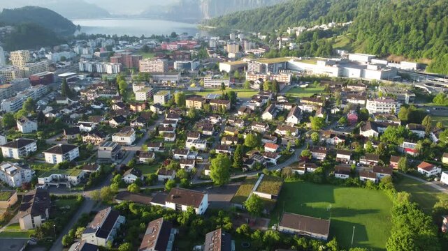 Aerial drone view of Lucerne cityscape, Lake Lucerne, and Swiss Alps mountains landscape, Switzerland