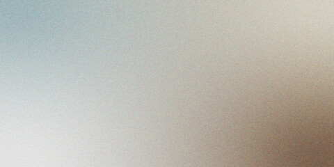 Abstract gradient background with granular texture featuring shades of blue and brown