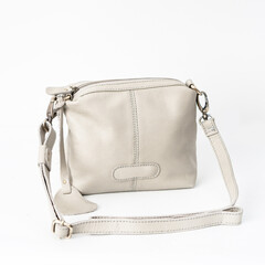 Bright grey leather shoulder bag for women isolated on white background, perfect for leather...