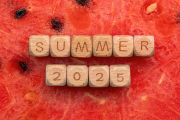 Summer 2025 wooden blocks on watermelon background