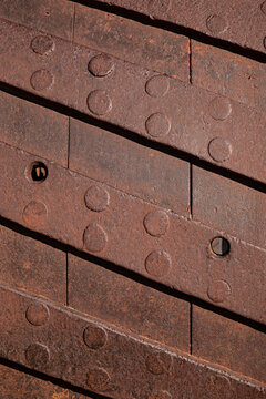 Close up of rusted metal machinery as background texture