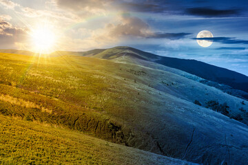mountain landscape with green meadows on summer solstice. day and night time change concept. picturesque wallpaper of conceptual travel destination with sun and moon at twilight. distant great peak