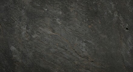Dark rough stone surface with subtle textures and cracks