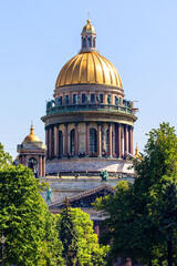 Fototapeta premium Famous St. Isaac Cathedral on summer day. Picturesque view from the Senate Square on summer day. Saint-Petersburg, Russia