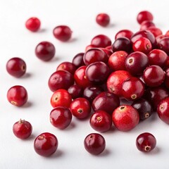 Cranberries scattered on a white surface, macro photography style