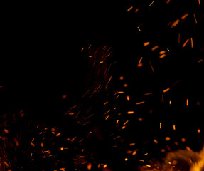 A black background with a lot of fire and smoke