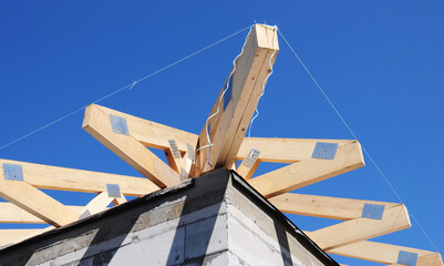 Roof framing corner.  Roofing construction with wooden beams, rafters, trusses roof framing.