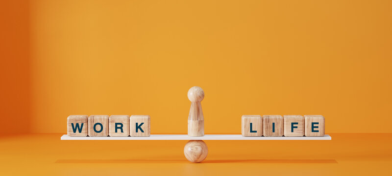 Work life balance concept. Wooden cube block with word LIFE and WORK on seesaw.