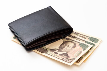 白背景に3万円と二つ折りの財布