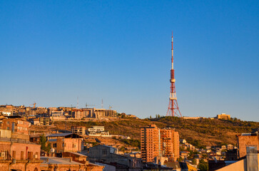 Yerevan TV tower and Nork hill at sunset scenic view from Tumanyan street in Kentron district (Yerevan, Armenia)	