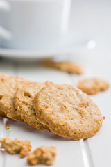 Sweet oatmeal cookies on white table.