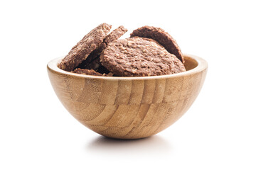 Sweet oatmeal cookies in bowl isolated on white background.