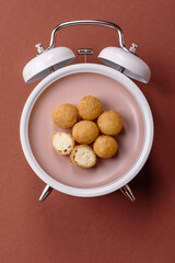 Cheese balls, croquettes fried, breaded fast food with sauce. Concept of time to eat fast food