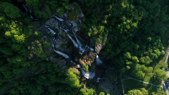 Top down aerial view of dramatic Acquafraggia waterfall in Sondrio, Italy