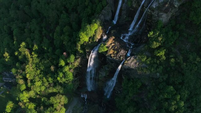 Dramatic waterfall in Sondrio, Italy mountains, Acquafraggia cascade aerial landscape