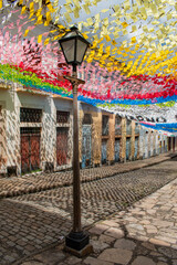Brazil: daily life and skyline, a street lamp and the colorful decorations in the alleys of Sao Luis, the capital and largest city of the Brazilian state of Maranhao