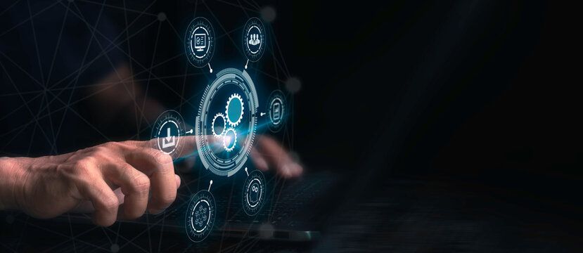 Man use laptop with virtual automation technology to automate business tasks with AI. Digital transformation and change management. Robotic process automation concept.