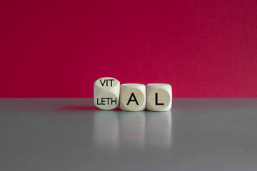 Vital vs lethal symbol. Turned a wooden cube and changes the word 'lethal' to 'vital'. Beautiful...